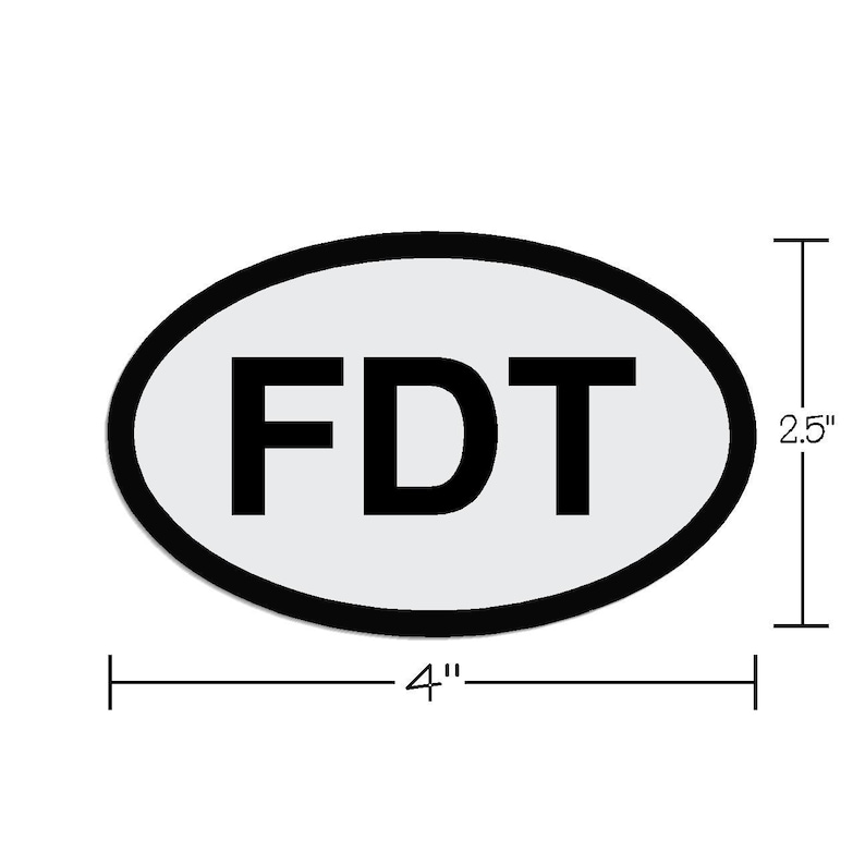 May include: White oval sticker with a black outline and the text "FDT" in black letters. The sticker is 4 inches wide and 2.5 inches tall.