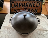 Unmarked Wagner 8 Dutch Oven With Whistle Top Basting Lid.
