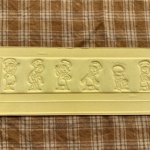 1950’s Tappan Man Embossed Print Ad Fiber Mat