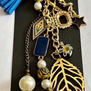 Llavero de estilo elegante y único, dije para bolso o cartera, cadena en tono dorado, estilo vintage reciclado
