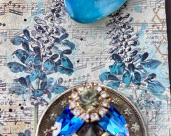 Charming Magnets set with cameo designs and crystal-laccents.