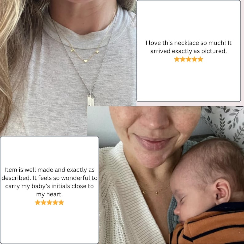 May include: A delicate gold-toned necklace featuring a small heart charm flanked by two letter charms, E and K, suspended on a thin chain. The necklace is worn layered with a second chain featuring two rectangular vertical bar pendants.