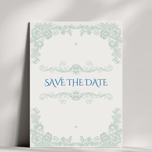Może przedstawiać: Biała karta z zaproszeniem na ślub z niebieskim kwiatowym obramowaniem i tekstem "Save the Date" w kolorze niebieskim.
