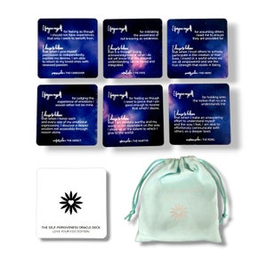 May include: A set of self-forgiveness oracle cards with a teal blue background and white text. The cards feature a variety of inspirational messages and affirmations. The cards are packaged in a light blue drawstring bag with a white flower design.