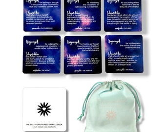 May include: A set of self-forgiveness oracle cards with a teal blue background and white text. The cards feature a variety of affirmations and messages about self-love and acceptance. The cards are packaged in a teal blue drawstring bag with a white flower design.