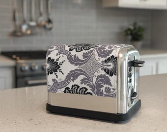 Magnetische hoes broodrooster: witte, zwarte en grijze damastprint. Beperkt