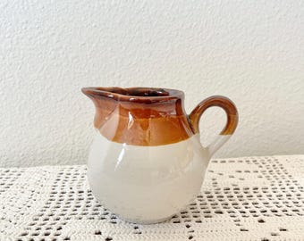 Small Brown and Beige Dual Tone Pottery Pitcher - 3.5"