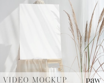 Social Media Video Mockup, Welcome Sign Video Mockup On Wooden Easel, White And Beige Vases With Dry Flowers On Round Coffee Table, Reels