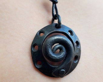 Storm pendant, hand forged iron