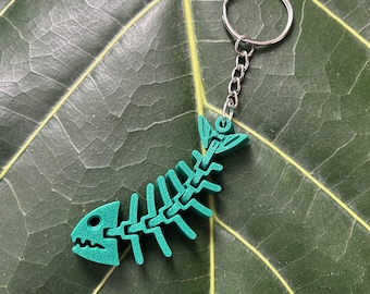 Porte-clés squelette de poisson vert - Os de poisson articulé imprimé en 3D - Porte-clés bizarres - Fidget de bureau gothique - Cadeau unique