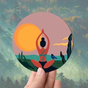 May include: A colorful illustration of a person in a yoga pose with a sunset in the background. The person is wearing a red and orange outfit and has their arms raised above their head. There is a blue bird sitting on a branch in the foreground.