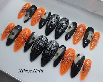 Spiders and webs spooky black and orange press on nails hand painted on long stilettos. ONE SET LEFT!