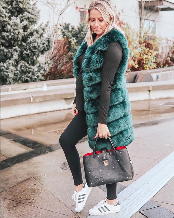 green fuzzy vest