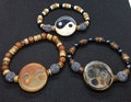 Yin Yang Lava Stone Aromatherapy Bracelet - Tao Tibetan Agate Dzi Coconut Yoga Stretch Bracelet product logo