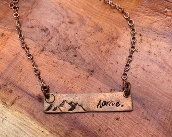 hand stamped moutain scene on artisan copper blank