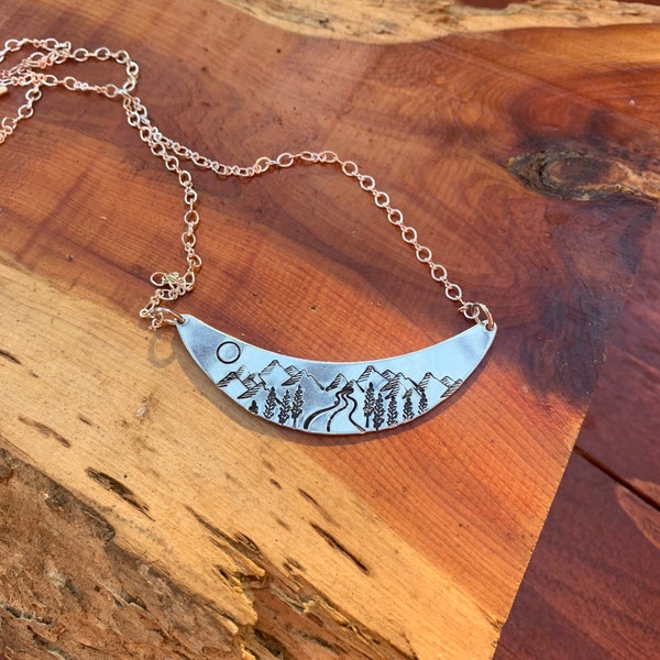 Custom hand stamped curvy road & mountain scene on Alkeme metal.