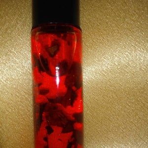 Esoteric oils essential oil blend conjure roll ons Love money and success