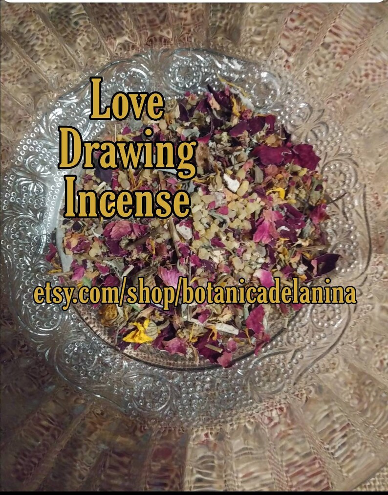 May include: A glass bowl filled with a blend of dried herbs, flowers, and crystals for love drawing incense. The mixture includes dried rose petals, yellow flowers, and white crystals. The text "Love Drawing Incense" is written in gold letters on the image. The text "etsy.com/shop/botanicadelanina" is also included in the image.