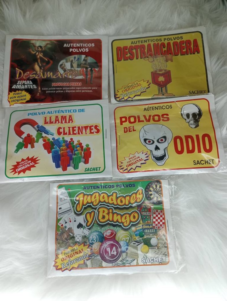 May include: Four colorful packets of powder with different labels. The packets are labeled "Desamarre", "Destrancadera", "Llama Clientes", and "Polvos del Odio". Each packet has a different image and text. The packets are all labeled "Sachet".