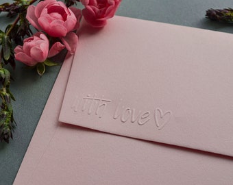 Envelope pink with embossed "with love" lettering