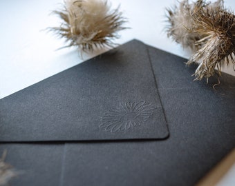 Envelope black with embossed flower