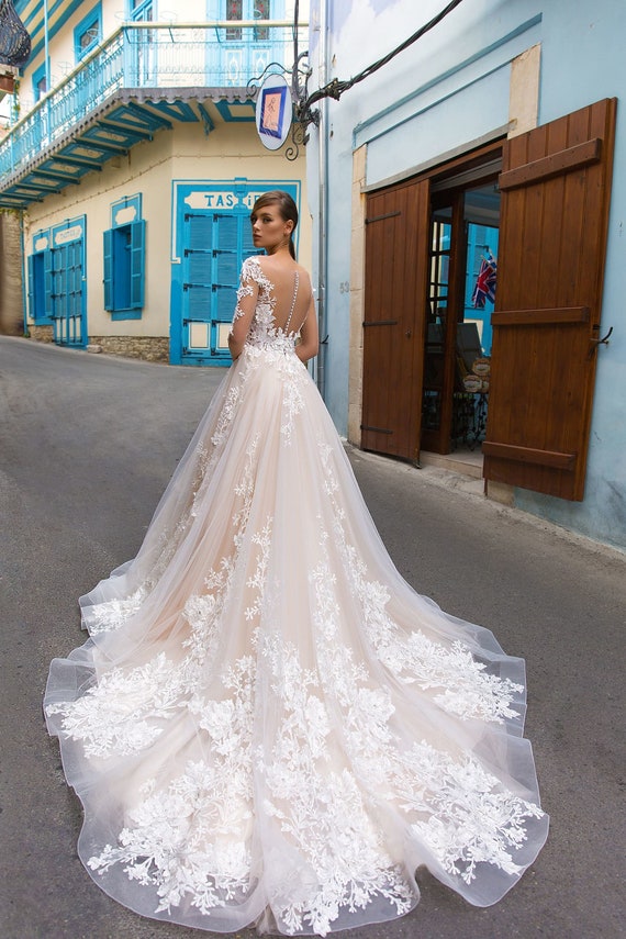 blush wedding dress with flowers