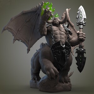 May include: A detailed, gray, sculpted figurine of a demon with large horns, wings, and a spear. The demon is wearing a chain necklace and a black, armored chest piece. The demon is holding a spear with a green gem at the top.