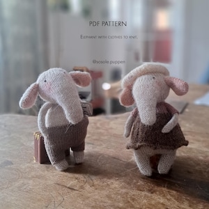 May include: Two knitted elephant dolls with pink ears and trunks. One wears brown pants and sits on a small brown suitcase, while the other wears a brown dress and a matching hat. Text reads: PDF PATTERN ELEPHANT WITH CLOTHES TO KNIT. @sosole.puppen