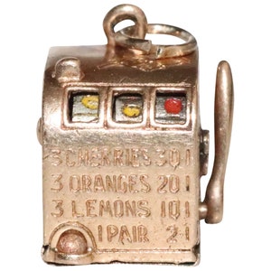 Vintage 14 kt geelgouden slotmachinebedel