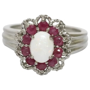 Vintage sterlingzilveren ring met robijn en opaalbloem
