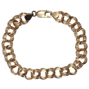 14 kt geelgouden bedelarmband met drie strengen