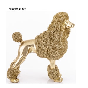 May include: Gold-colored poodle figurine with a fluffy, textured finish. The poodle is standing on all four legs with its tail curled up.