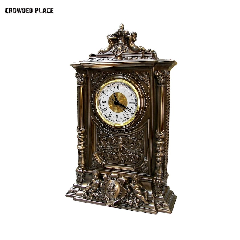 Baroque mantel clock with cupids