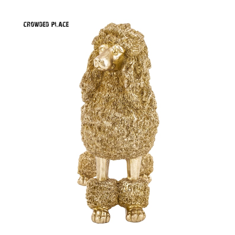 May include: A gold-colored poodle figurine with a fluffy, textured surface. The figurine is standing on four legs and has a curled tail.