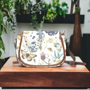 Wildflowers & Butterflies Boho Cross-Body Saddle Bag, Boho Cottagecore Floral Handbag, Green Witch Floral Purse, Witchy Hippie Saddle Bag