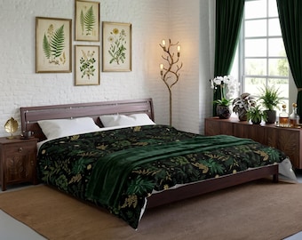 May include: A dark-colored comforter featuring a botanical pattern of green and gold leaves and flowers, topped with a solid dark green throw blanket. The bedding is set on a wooden bed frame with white pillows in a room with white brick walls.