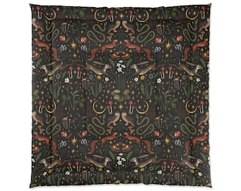 May include: A black and white patterned duvet cover with a repeating design of hares, snakes, mushrooms, and stars. The design is on a dark background with a subtle texture.