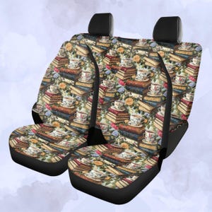 May include: Car seat covers with a vintage design featuring stacks of books, teacups, and floral accents in shades of brown, beige, and green. The covers have a black base and headrest.