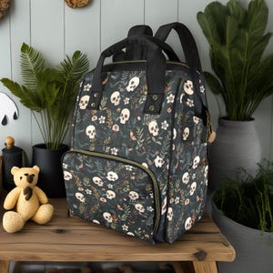 Niedlicher Schädel und Blumen Windel Rucksack, süßes Goth Baby-Material, Hexen gruselige süße Windeltasche, gruselige süße Windeltasche, Hexen Mutter Baby Geschenke