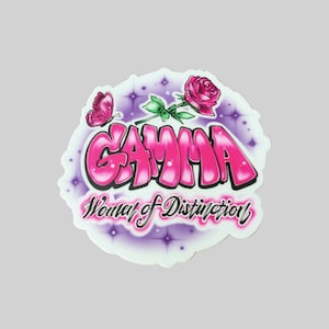 May include: A pink and purple sticker with the word "GAMMA" in a graffiti style font. The sticker also features a rose, a butterfly, and the text "Women of Distinction".