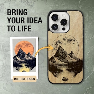 May include: A phone case with a wooden back, displaying a mountain and moon illustration. The case has a black frame. The design features a detailed drawing of mountains, a river, and a full moon. The text "BRING YOUR IDEA TO LIFE" is at the top.