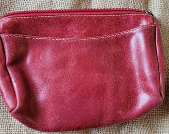 Small red leather cosmetic travel bag