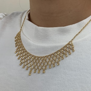 139# Elegant 14kt Yellow Gold Jewelry Set with Necklace, Bracelet, and Dangle Earrings