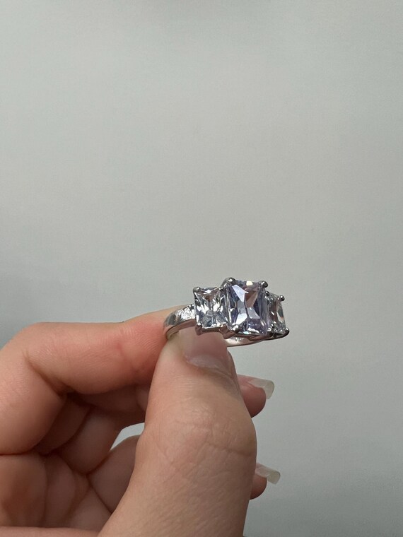 76# Sterling Silver 3 Stone Radiant