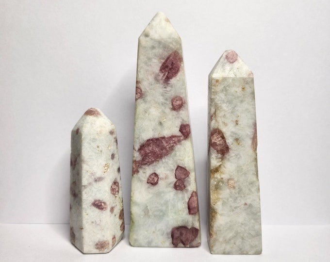Lepidolite with Rubellite in Quartz. Pink and purple tones for harmony and heart energy. Strengthens the heart chakra. Each piece is very unique.