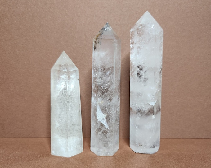 Rock Crystal/Clear Quartz: purifies energy, promotes clarity, strengthens intuition, helps with focus and positive thoughts.