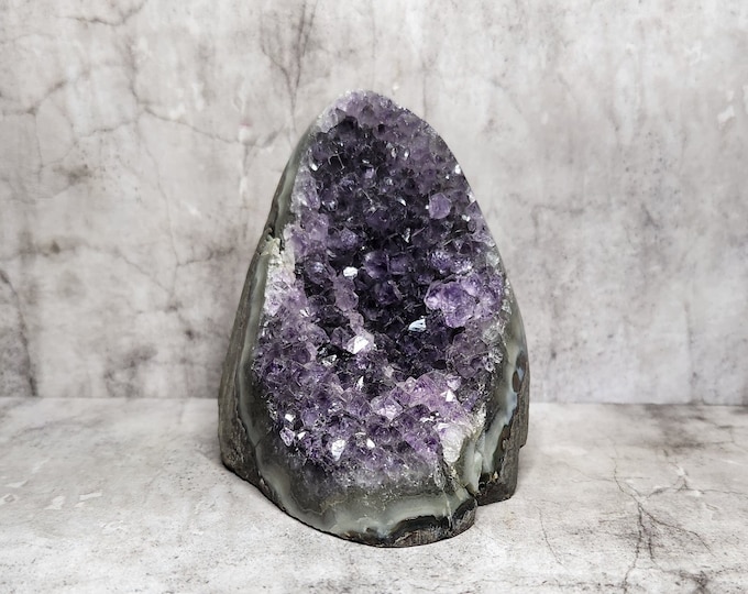 Amethyst Geode: Beautiful cluster of crystals. Brings peace, clarity and promotes spiritual growth. Magical addition for balance