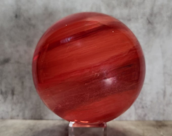 Molten Red Quartz: Enchants with its vibrant hues and intriguing patterns, bringing a sense of passion to any room.