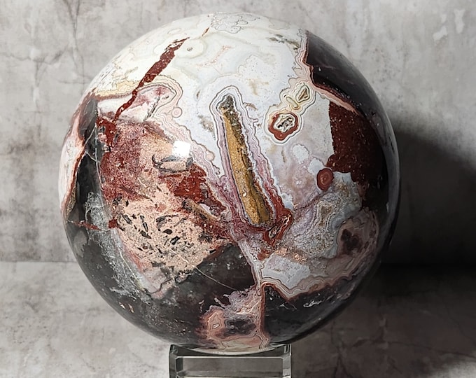 Polychrome Jasper with earthy colors and flowing patterns promotes balance, resilience and protection. A stone that helps with anchoring