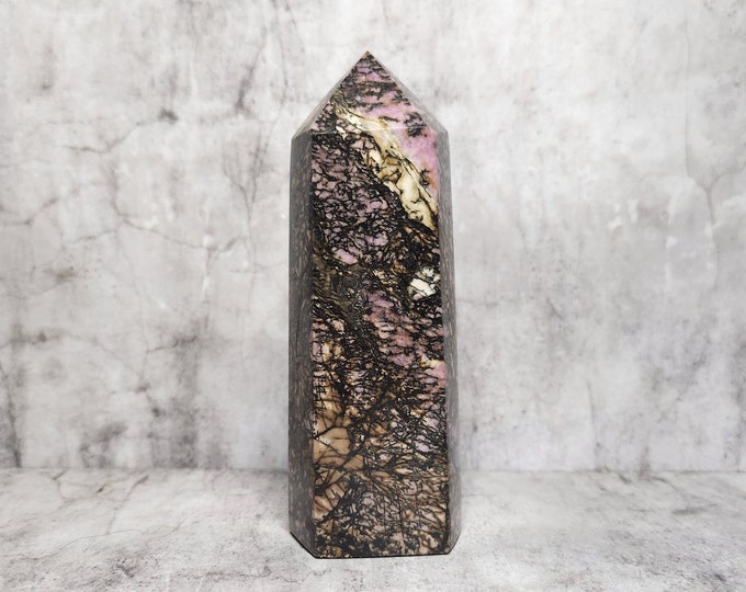 Rhodonite: Stimulates love and self-development. Promotes emotional balance, helps with self-expression. Supports harmony in relationships.